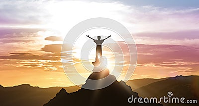 Man Standing On Top Of Mountain Looking At Daybreak Outdoors Stock Photo