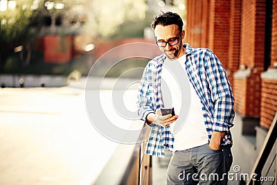 Man stands on a city street Stock Photo