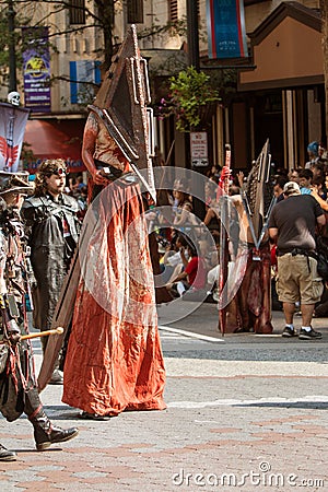 Man On Stilts Wears Bloodstained Costume In Dragon Con Parade Editorial Stock Photo