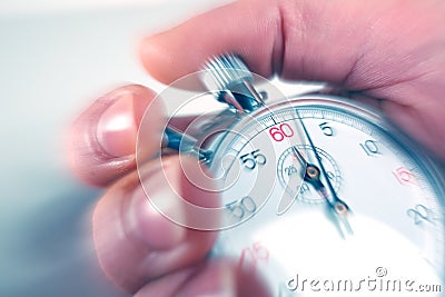 Man stopping a stopwatch Stock Photo