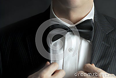 Man Straightens Tux Stock Photo