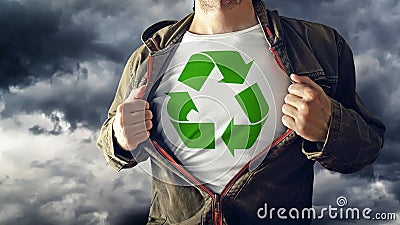 Man stretching jacket to reveal shirt with recycle symbol printed Stock Photo