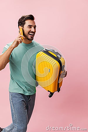 Man studio guy travel passenger service phone traveler suitcase smartphone white smile baggage mobile Stock Photo