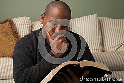 Man Studying the Bible Stock Photo