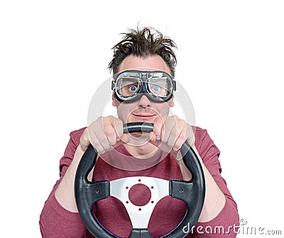 Man in stylish goggles with steering wheel, isolated on white background. Car driver concept Stock Photo