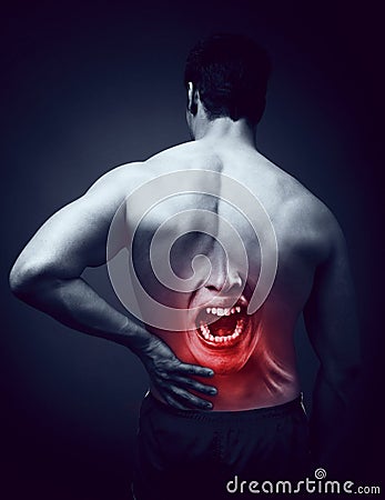 Man suffering back pain. Lower back health problems Stock Photo