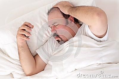 Man suffering from a hangover Stock Photo