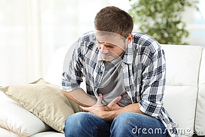 Man suffering stomach ache Stock Photo