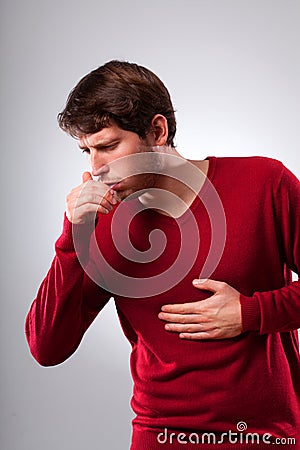 Man suffering from strong cough Stock Photo