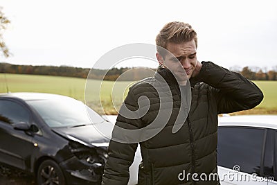 Man Suffering With Whiplash Injury After Car Accident Stock Photo