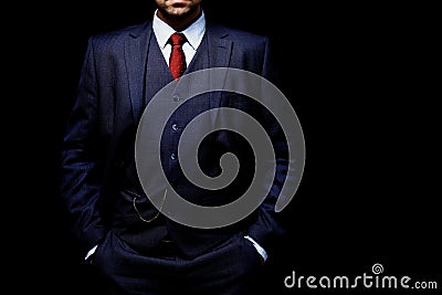 Man in suit on black background Stock Photo