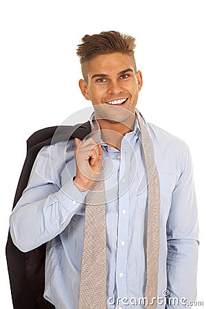 Man suit coat over shouldr tie undone smile Stock Photo