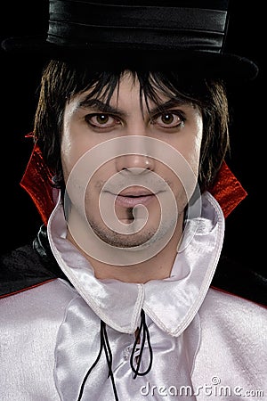 Man in a suit of Count Dracula Stock Photo
