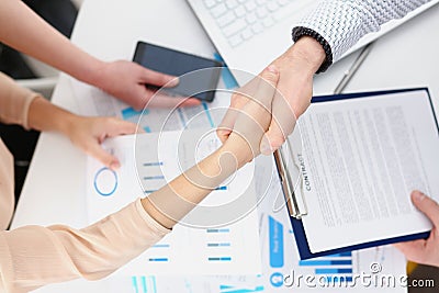 Man in suit shake hand as hello in office closeup Stock Photo