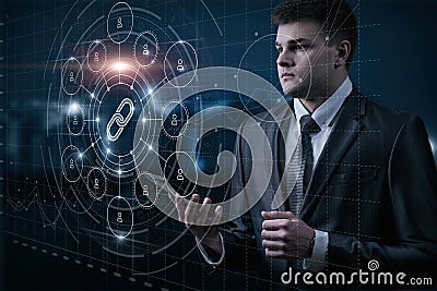 Man in suit studying web link icon connecting users Stock Photo