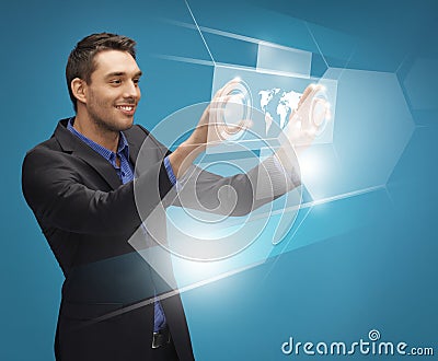 Man in suit working with virtual screens Stock Photo