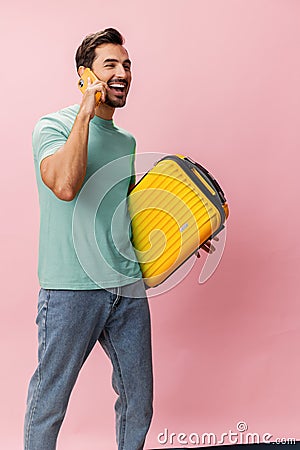 Man service traveler passenger white phone smile guy suitcase mobile travel baggage smartphone studio Stock Photo