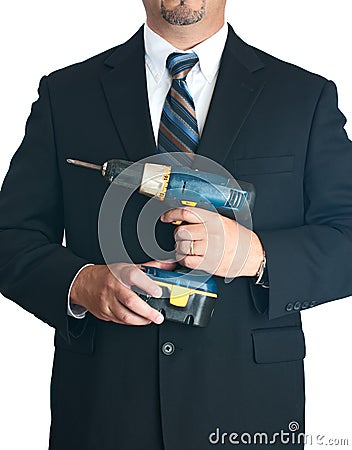 Businessman holding drill Stock Photo