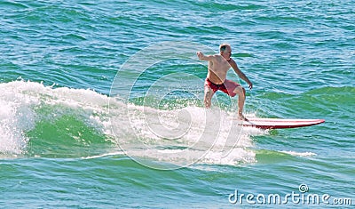 Man Surfing on Lake Michigan Editorial Stock Photo
