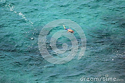 The man Surfing in sea - green colour water Stock Photo