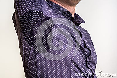 Man with sweating under armpit Stock Photo
