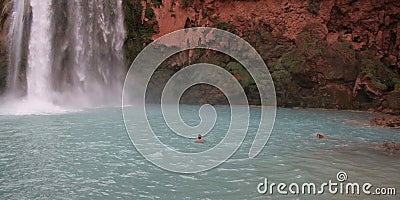 Man Beneath Havasu Falls Stock Photo