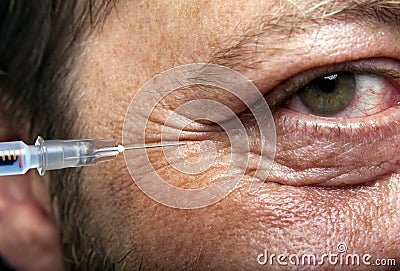 Man with syringe Stock Photo