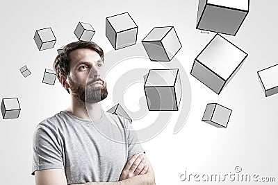 Man in T-shirt and cubes Stock Photo