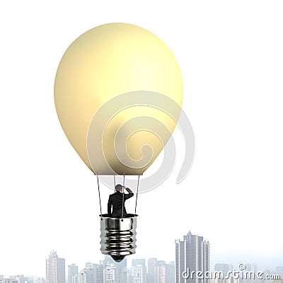Man taking glowing lamp balloon floating over city building Stock Photo