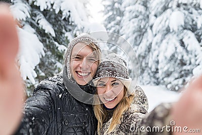 Man Taking Selfie Photo Young Romantic Couple Smile Snow Forest Outdoor Stock Photo