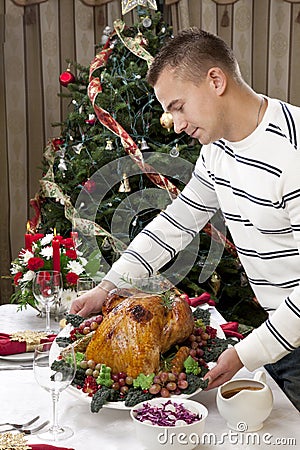 Man Thanksgiving christmas roasted turkey Stock Photo