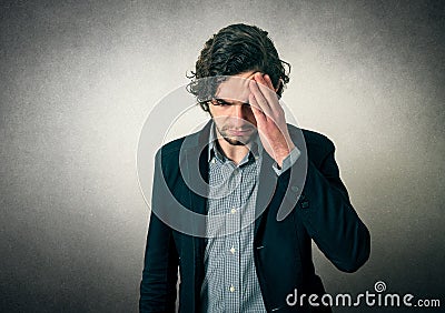 Man thinking or has head pain Stock Photo