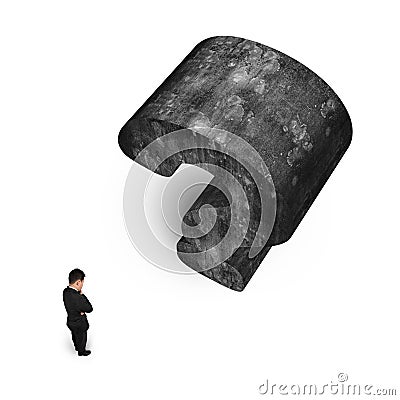 Man thinking with huge 3D concrete question mark white background Stock Photo