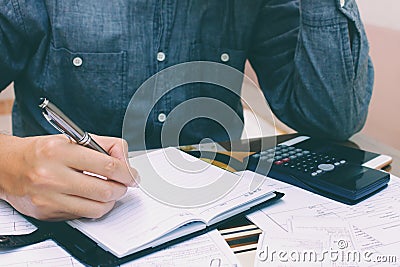 Man thinking and stress in problem with expenses at home office. Stock Photo