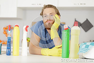 man tired from cleaning Stock Photo