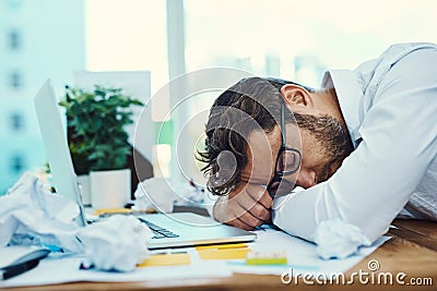 Man, tired and sleeping on office desk with burnout, fatigue and overworked business employee with glasses, documents Stock Photo