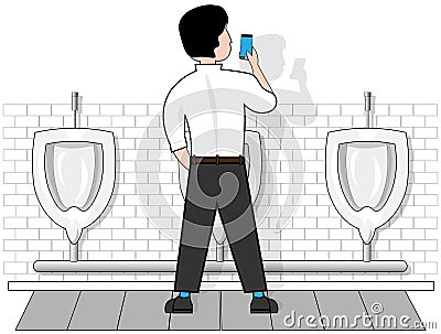 A man on an isolated white background in a toilet at the urinal, looks at the phone that holds in his hand. Stock Photo