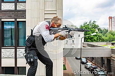 Man took aim with the pistol. Action Movie Style Stock Photo