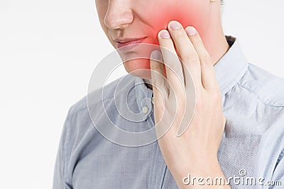 Man with a toothache, pain in the human body Stock Photo