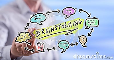 Man touching a brainstorming concept on a touch screen Stock Photo