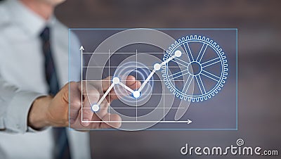 Man touching a digital business analysis concept on a touch screen Stock Photo