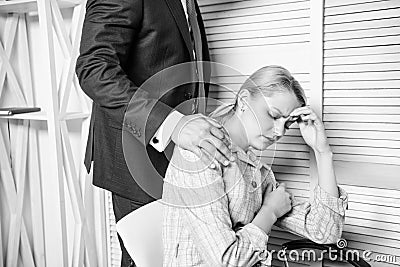 Man touching girl. Protection female rights. Workplace bullying concept. Stock Photo