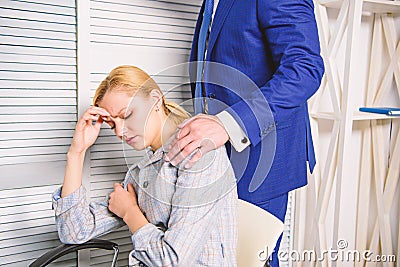 Man touching girl. Protection female rights. Workplace bullying concept. Stock Photo