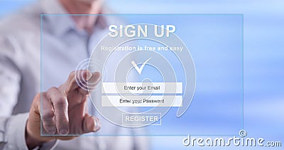 Man touching a signup concept on a touch screen Stock Photo