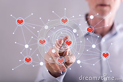 Man touching a virtual social network on a touch screen Stock Photo