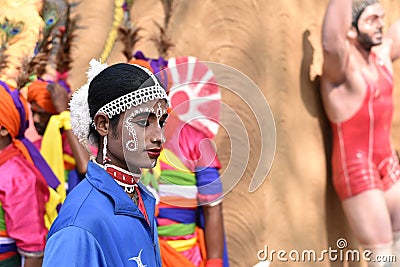 Man in traditional Indian ethnic make up attire, enjoying the fair Editorial Stock Photo