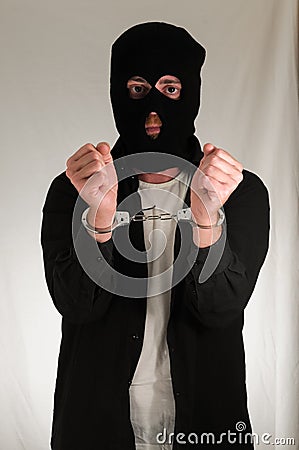 Man Traped in Handuffs Stock Photo