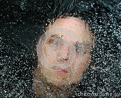 Man Trapped Under Ice Stock Photo