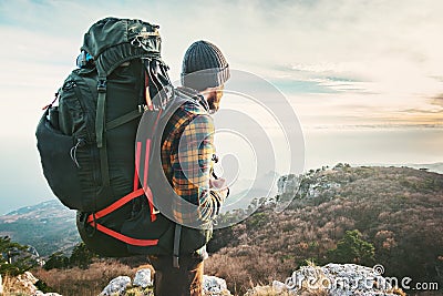 Man Traveler with big backpack hiking mountains expedition Stock Photo