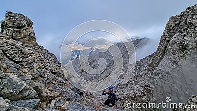 Man trekking on mystical hiking trail leading to Mount Olympus (Mytikas, Skala, Stefani) in Mt Olympus National Park Stock Photo